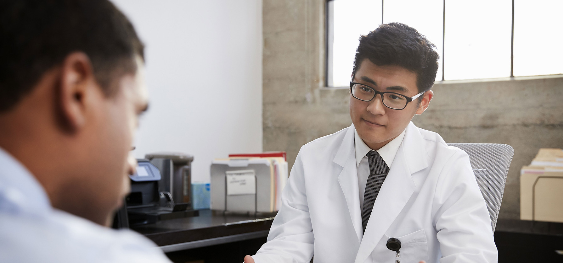 Doctor reviewing patient diagnostics